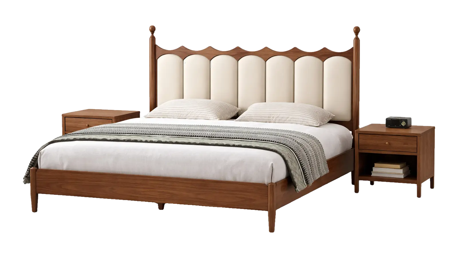 Wooden bed with a scalloped headboard, cream channel cushions and a nightstand